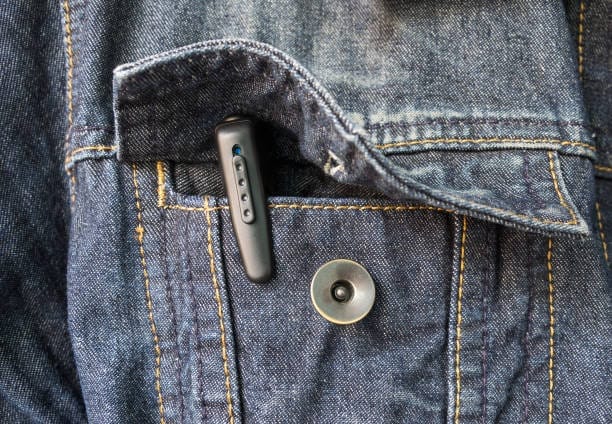 the pen camera, hidden or spy camera in a jacket pocket.